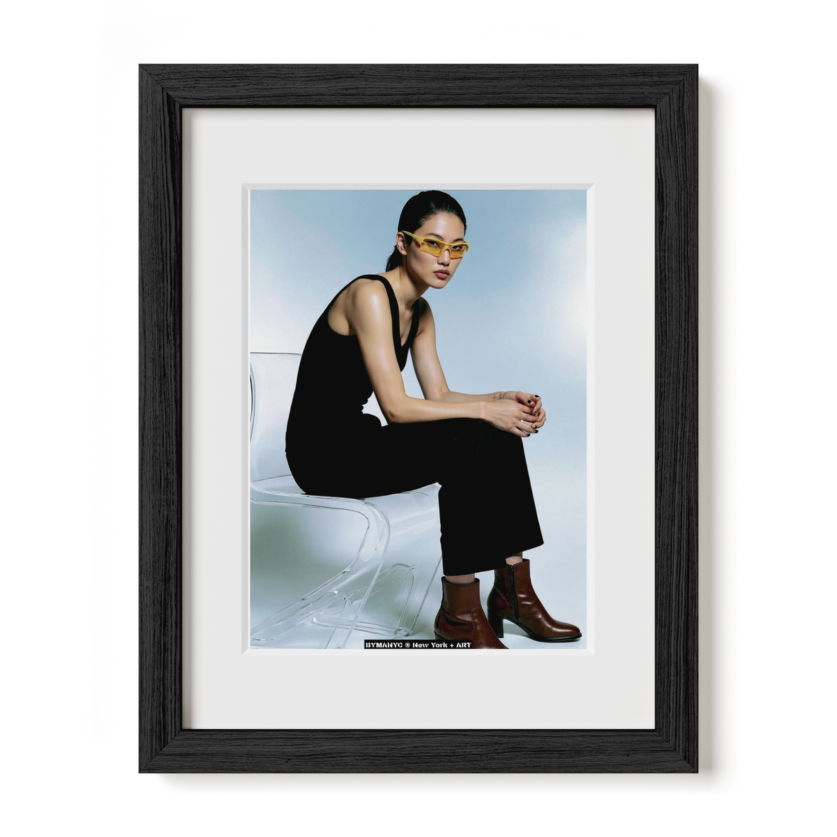 POSTER of ART AVANT-GARDE - THE AMBER CHAIR - Limited Edition High-Fashion Seated Portrait with Yellow Tinted Sunglasses and Brown Leather Boots - BYMANYC ® New York + ART